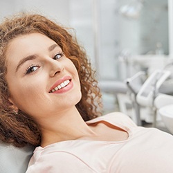 Female patient at dental appointment for dental implants in Midwest City, OK