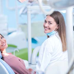 Woman in dental chair for a filling