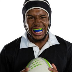 Rugby player opening mouthguard