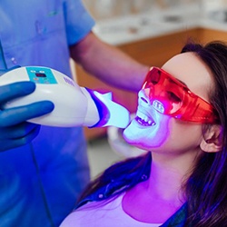 a patient undergoing teeth whitening treatment