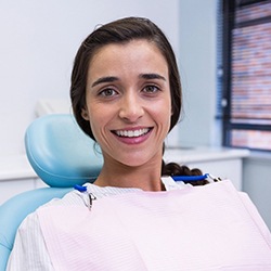 Smiling young woman with dental implants in Midwest City