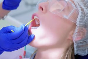 Patient receiving fluoride treatment. 