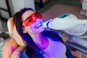 Woman having teeth whitened.